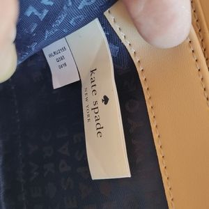 Beautiful cream and navy blue Kate Spade purse set.